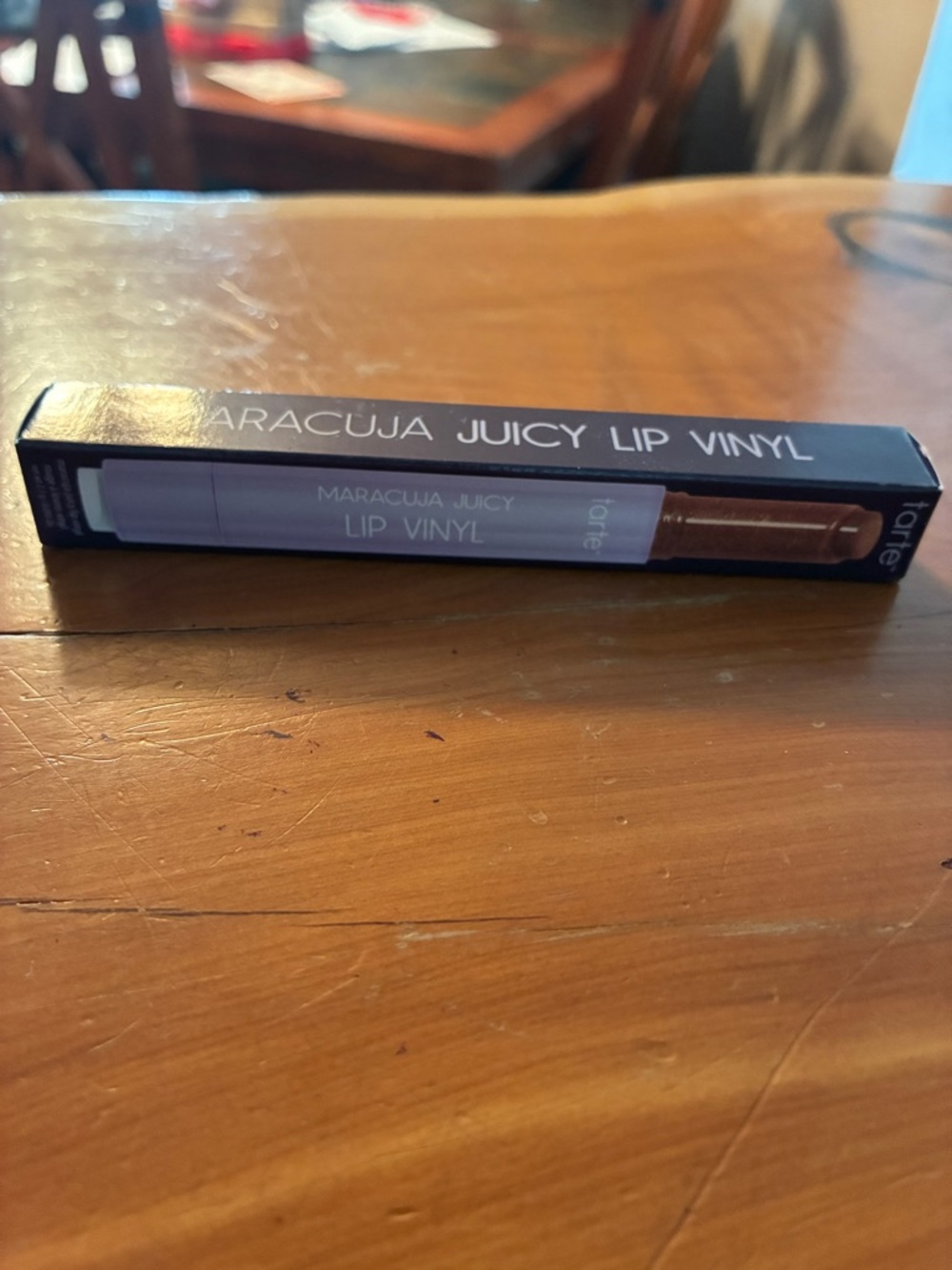 tarte Maracuja Juicy Lip Vinyl — Deep Brown Gloss